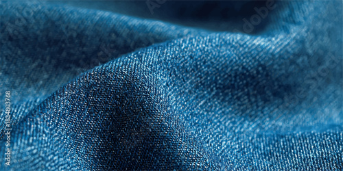 Close up abstract texture of deep blue fabric with subtle shimmering threads and soft folds