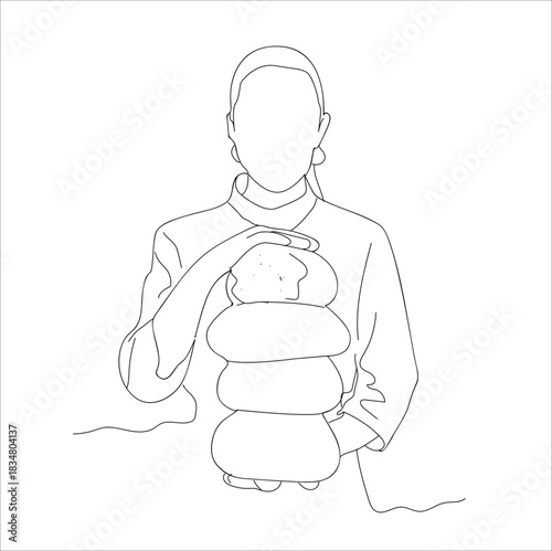 female chef carrying bread