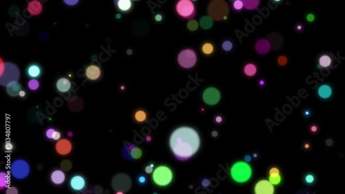 glitter dust bokeh background loop 4k video. gold sparkles particles stars black background video. colorful happy birthday celebration backgrounds concept. christmas glittering new year.