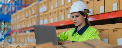 Warehouse worker working in warehouse storage. Foreman or worker work at factory site check up products in site. Inventory worker working in  factory Storehouse