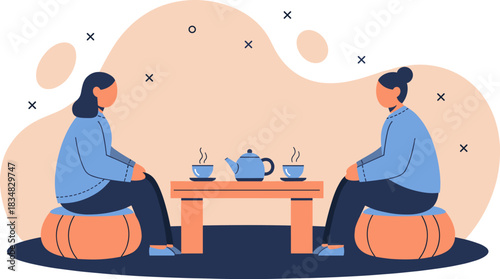 Two women enjoy a relaxing tea time together, sitting across from each other at a small table, sharing a moment of calm.
