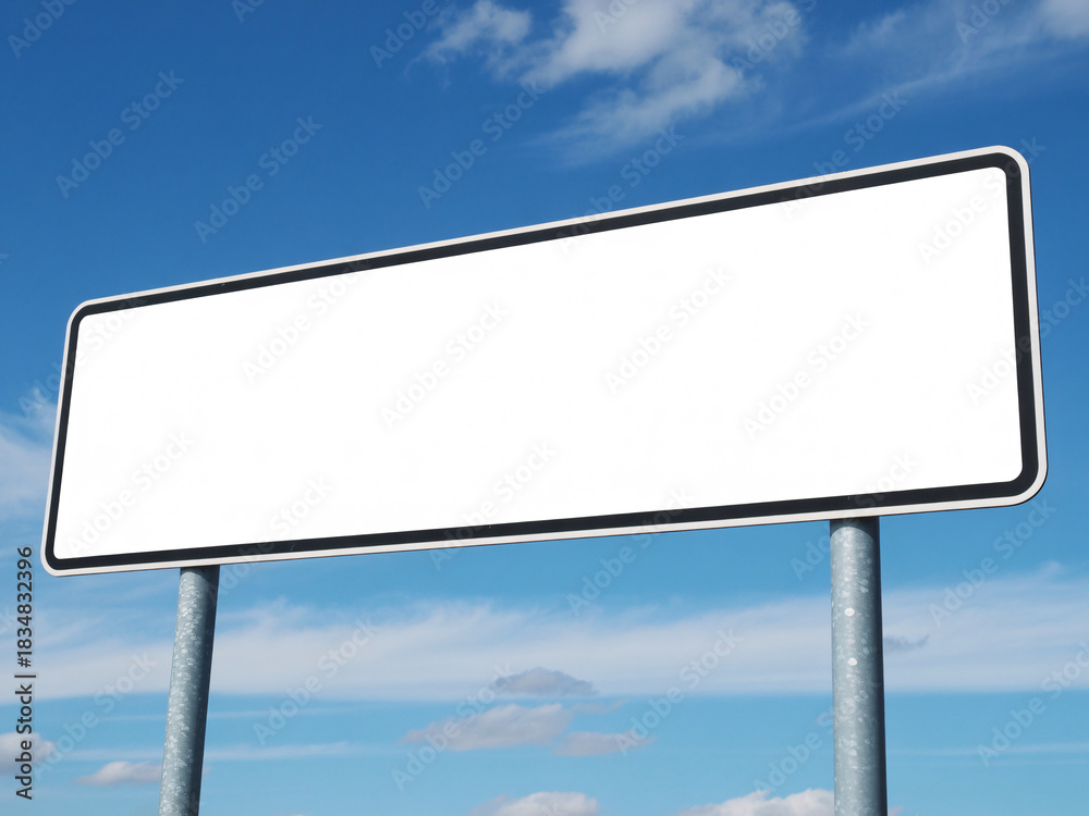 Fototapeta premium Blank road sign against a clear blue sky invites customization with your message for travel, direction, or business promotion