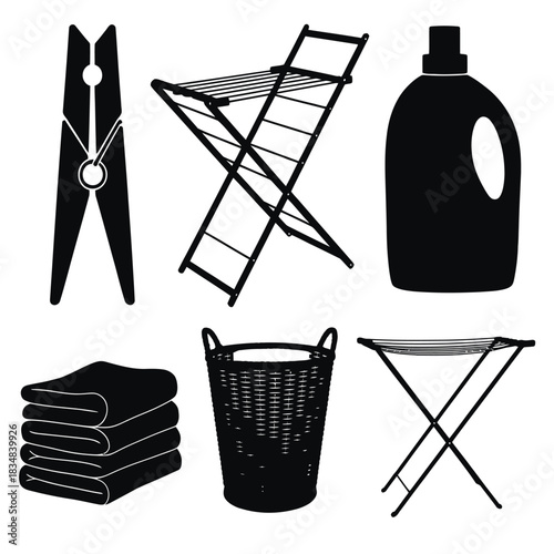 Collection of black silhouette icons representing laundry day items including a clothespin, drying rack, detergent bottle, towel stack, and hamper
