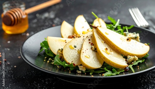 Close-up of pear salad with blue cheese and honey drizzle
