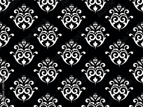 Wallpaper in the style of Baroque. White and black floral ornament. Seamless vector background. Graphic pattern for fabric, wallpaper, packaging. Ornate Damask flower illustration.
