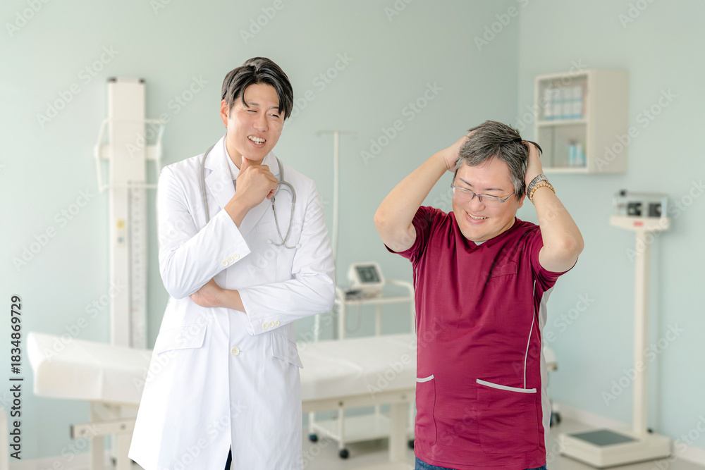 Obraz premium 頭を抱える医師