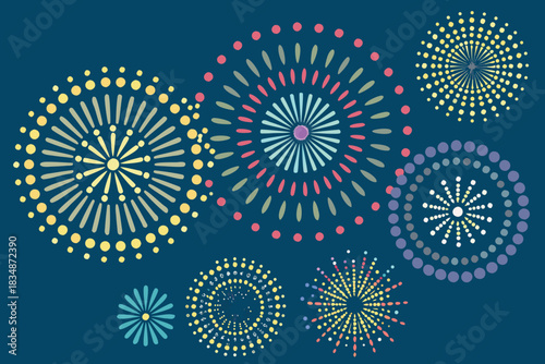 Colorful fireworks display with various patterns and shapes against a dark background