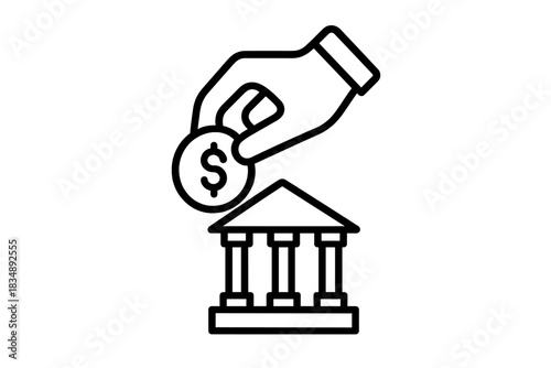 Hand depositing dollar coin into bank building symbolizing savings and investment