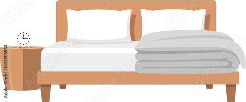 Start your day rested with this cozy bed and alarm clock in a peaceful room