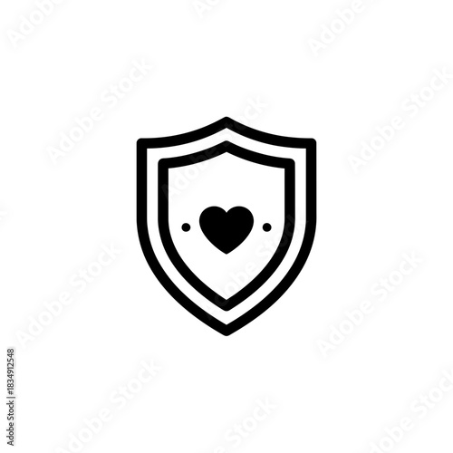 Shield shaped emblem with suspended heart