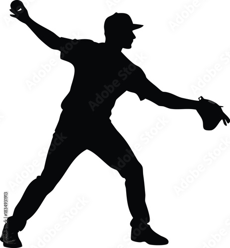 Silhouette of a baseball player in mid pitch showcasing athletic form and motion