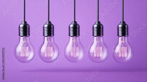 Five hanging light bulbs against a vibrant purple background.