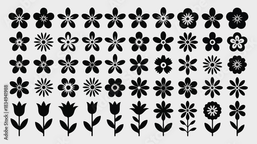 Assortment of black silhouette flower icons including blossoms and tulips floral nature