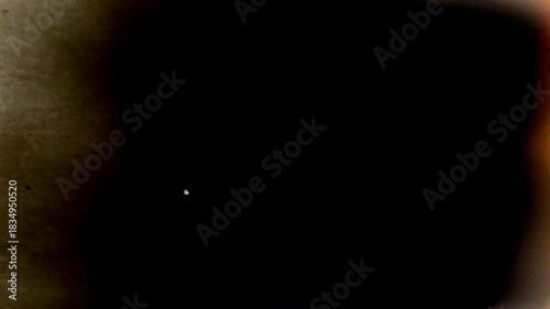 Vintage film burn cinematic overlay with moody dramatic glow and textured light streaks