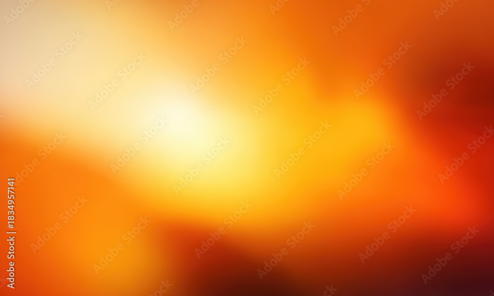 Naklejka premium A vibrant abstract background featuring warm tones of orange and yellow, evoking a sense of energy and warmth.