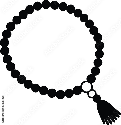 A simple black circular bracelet with a tassel representing spirituality and meditation high-quality