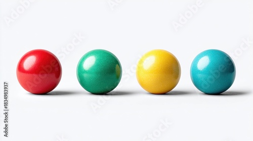 Four colorful spheres in a row against a clean white background