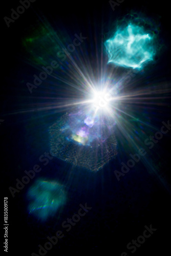 Abstract imitation sun starlight distant galaxy on a black background.