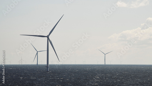 Offshore wind farm - wind turbines above surface of ocean, Baltic Sea, Germany
