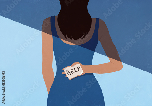 Woman in half shadow holding 