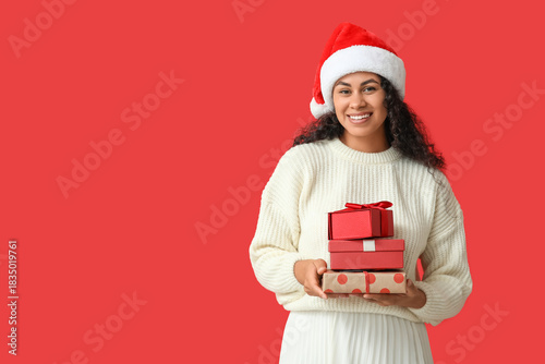 Smiling young woman in sant...