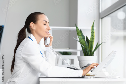 Adult female doctor talking...