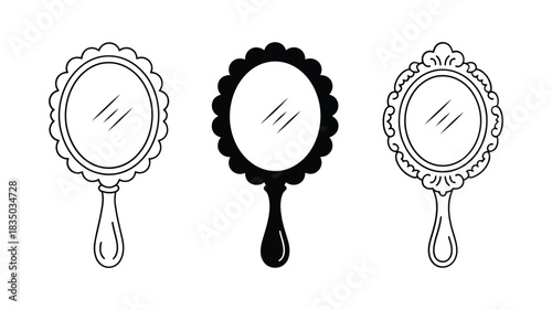 Collection of three vintage ornate hand mirrors with decorative frames and handles