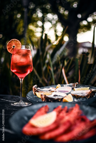 red wine sangria and spanish galician seafood snacks at sunset in santiago de compostela spain