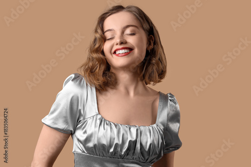 Smiling young woman with bo...
