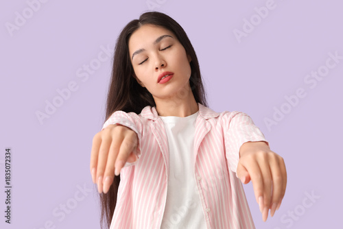 Female Asian sleepwalker in...