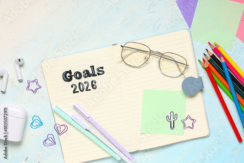 Notebook with 2026 goals, e...