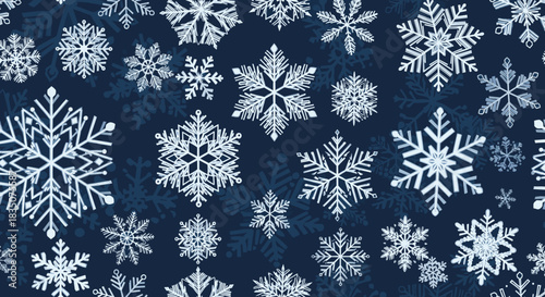Snowflakes in various patterns on dark blue background  