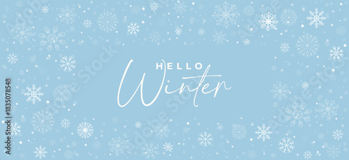 Winter banner with delicate white snowflakes and bokeh effect on a pastel blue background. Light textured background. Calm seasonal banner with handwritten typography