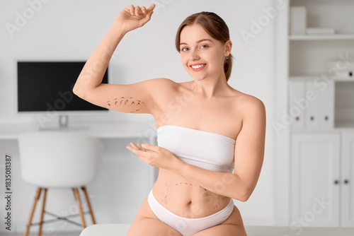 Young woman with marks on h...