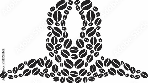 Abstract shape formed from coffee beans in black and white with a symmetrical design element present