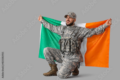 Young soldier with flag of ...