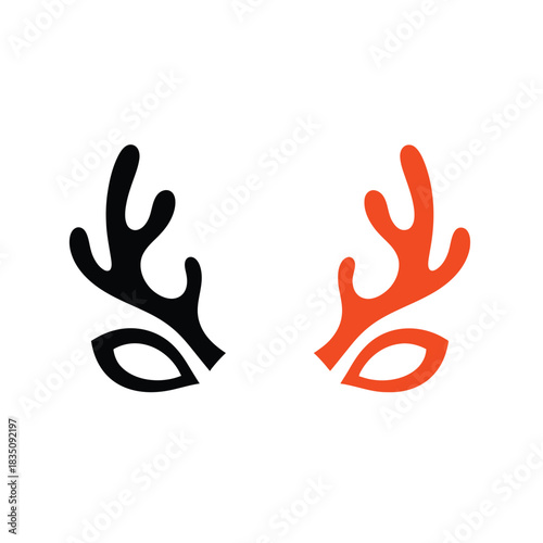 Abstract deer antler and eye logo design in black and orange colors