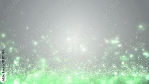 緑のキラキラの光の背景