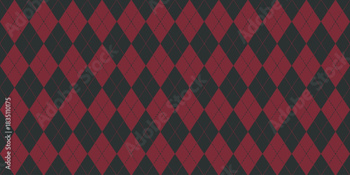 Classic seamless argyle geometric pattern background featuring a traditional diamond checkered texture in rich maroon red and dark charcoal gray, ideal for warm autumn textile fashion marketing, prepp