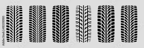 Diverse collection of six unique black tire tread patterns, stylized vector graphic illustrations representing high performance automotive vehicle footprints, crucial for safety and speed in transport