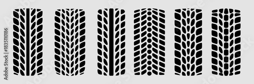 A versatile collection of six different black tire tread patterns, durable rubber track prints, vector graphics set perfect for automotive industry branding, racing event design, transportation concep