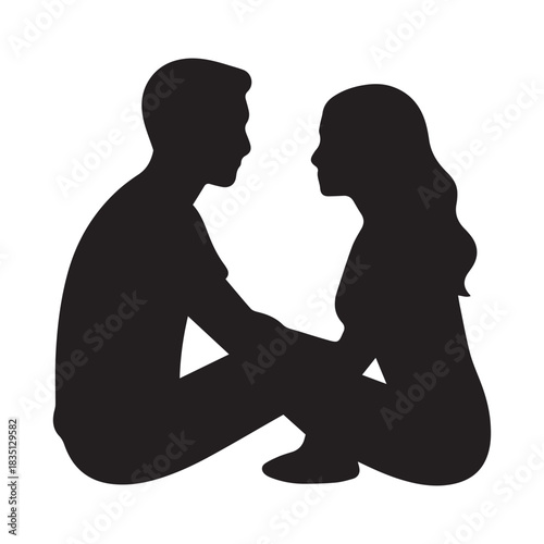 Silhouette of a couple holding hands, looking at each other with affection and connection