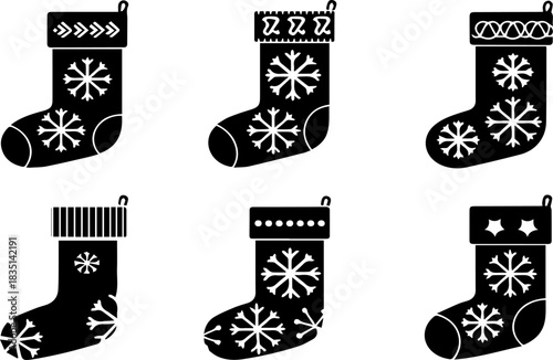 Collection of Christmas stockings with festive snowflake patterns silhouette style
