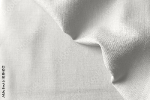 Textured folds of fabric in white color
