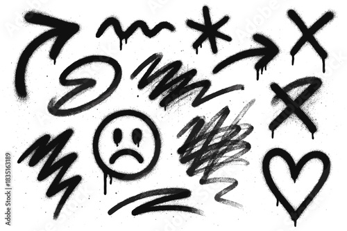 Graffiti elements with sad face and bold strokes. Sprayed texture adds expressive emotional tone