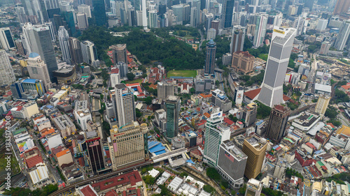 Kuala Lumpur, Malaysia - September 11, 2022: Aerial drone of capital of Malaysia is the city of Kuala Lumpur with skyscrapers and high-rise buildings.