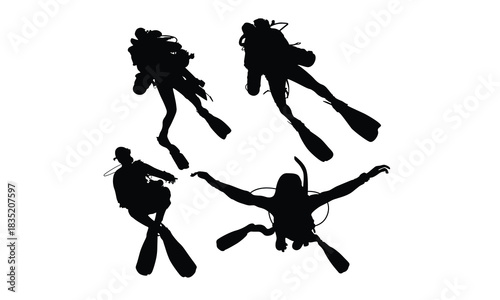 Silhouette of scuba diver swimming with gear