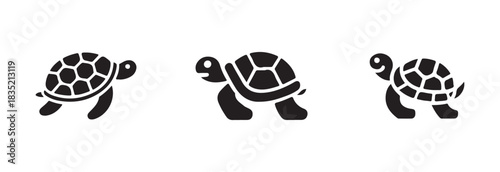 Collection of three distinct black turtle icons, two depicting a side view and one showcasing an outline style