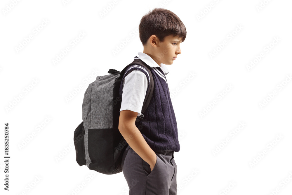 Fototapeta premium Schoolboy standing sad