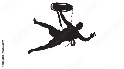 Dynamic silhouette of lifeguard diving to rescue swimmer with buoyant rescue can, embodying courage and swift action, ideal for safety campaigns and coastal themes